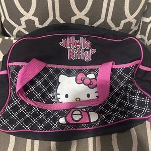 Super cute Hello Kitty duffel bag in black with pink trim and quilt pattern-